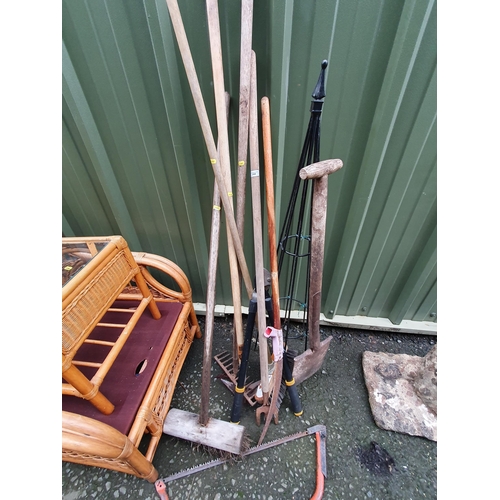 69 - A quantity of Garden Tools including Spade, Fork, Saw, Brushes etc