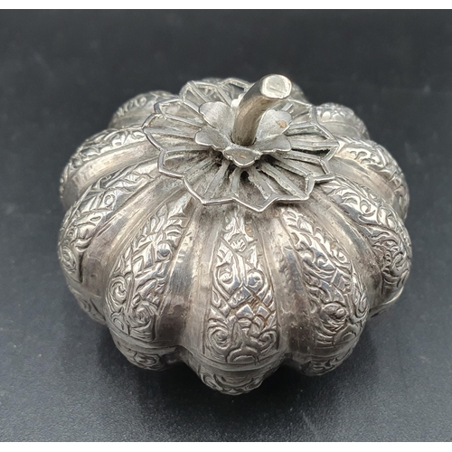 100 - An Indian white metal fruit shape Box and Cover, another embossed with figure, cushion shape Trinket... 