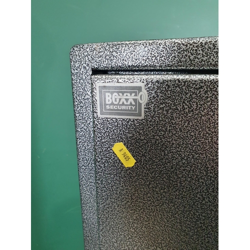 11 - A Boxx Security metal Gun Cabinet with key, 4ft 5in H