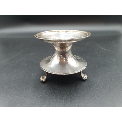 116 - A George V silver Capstan type circular Salt on scroll feet, Sheffield 1910, maker: FJR