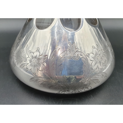 133 - A sterling silver overlaid glass Decanter with floral and leafage engraving, with stopper