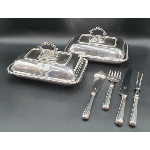 143 - A pair of plated oblong Entree Dishes and Covers, and a set of Cutlery including fish servers, carvi... 