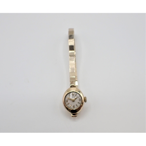 155 - A lady's Enicar Wristwatch the silvered dial with arabic numerals at quarters the remainder baton ma... 