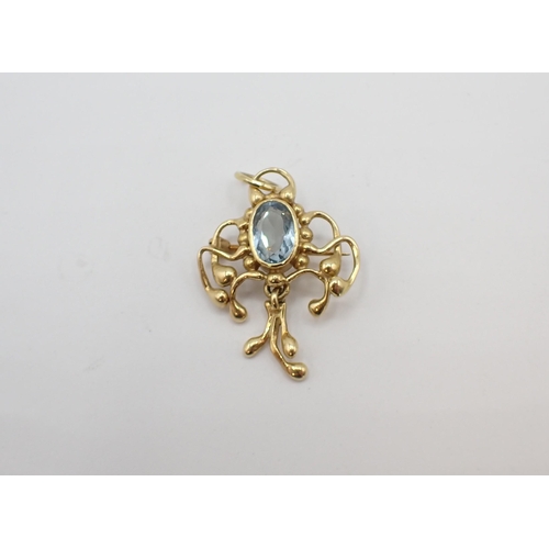 160 - An Aquamarine Pendant/Brooch rubover-set oval-cut stone in openwork frame in 18ct gold, approx 6.20g... 