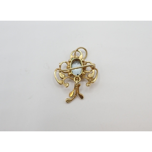 160 - An Aquamarine Pendant/Brooch rubover-set oval-cut stone in openwork frame in 18ct gold, approx 6.20g... 