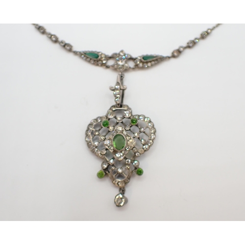 164 - An Edwardian style Necklace the openwork plaque set green and white paste on fine chain, stamped STE... 