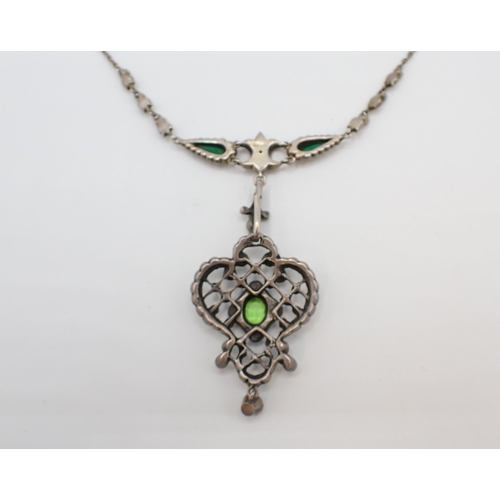 164 - An Edwardian style Necklace the openwork plaque set green and white paste on fine chain, stamped STE... 