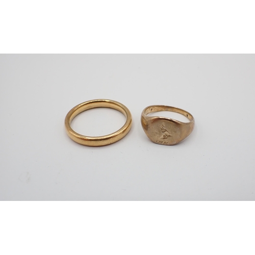 168 - A 22ct gold Wedding Band, approx 5.20gms and a 9ct gold Signet Ring with engraved seal, ring size H ... 