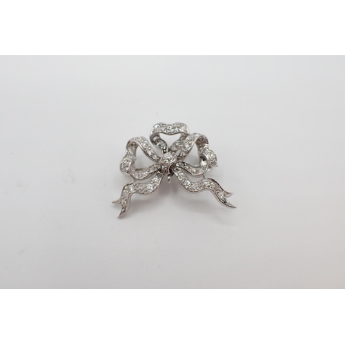 172 - A Diamond Bow Brooch pavé-set throughout old-cut stones, approx 30mm wide, 7.30gms
