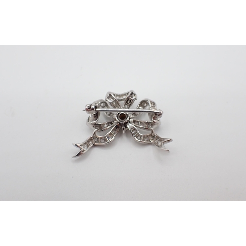 172 - A Diamond Bow Brooch pavé-set throughout old-cut stones, approx 30mm wide, 7.30gms