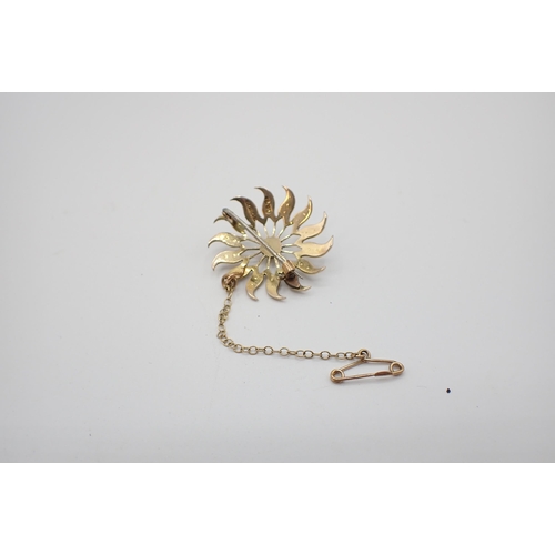 181 - A 9ct gold openwork Flowerhead Brooch set seed pearls, 30mm diameter, approx 3.85gms