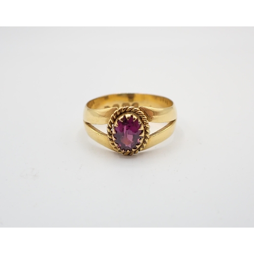 182 - A 22ct gold Band set oval-cut garnet, ring size N 1/2, approx 5.30gms