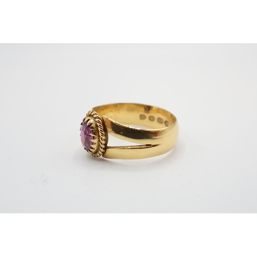 182 - A 22ct gold Band set oval-cut garnet, ring size N 1/2, approx 5.30gms