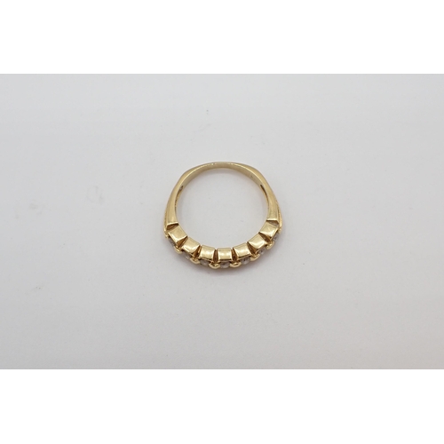 188 - A contemporary Diamond seven stone Ring set brilliant-cut stones, ring size M 1/2, approx 4.30gms