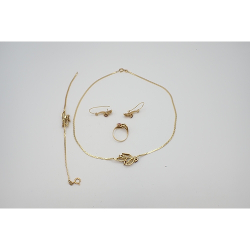 191 - An 18ct gold Necklace set red and white stones with Bracelet, Earrings and Ring ensuite, approx 21.9... 