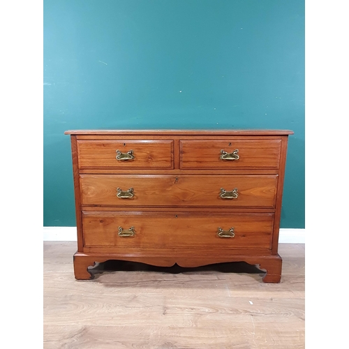 20 - A walnut Chest of two short, two long Drawers raised on bracket feet, 2ft 7