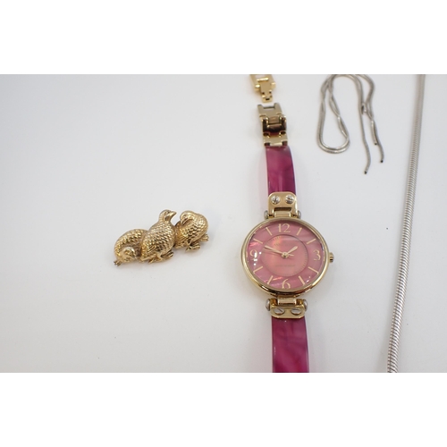 206 - An Anne Klein quartz lady's dress Watch, a yellow metal Brooch formed as three quail and a silver sn... 