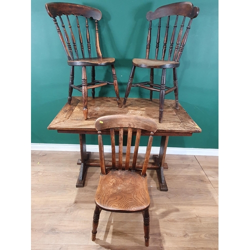 26 - An elm topped Kitchen Trestle Table, 4ft x 2ft 5in and three elm seated Kitchen Chairs (R9)