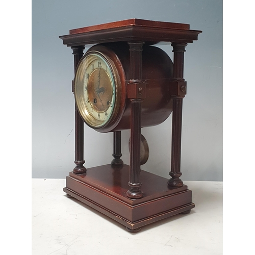 31 - A 19th Century mahogany Mantle Clock with circular movement supported by fluted columns on rectangul... 