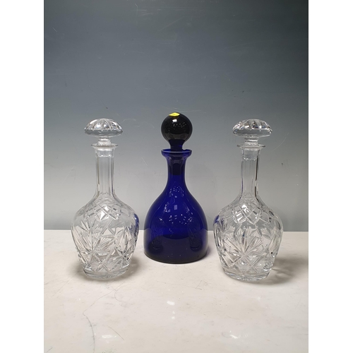 A Bristol Blue Glass Decanter And Stopper And A Pair Of Cut Glass Decanters And Stoppers R8