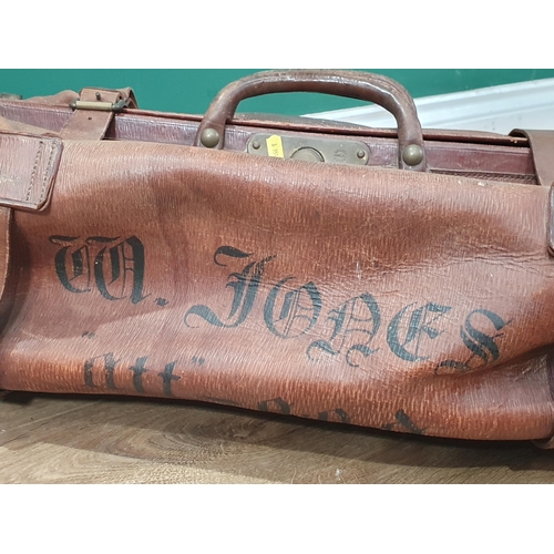 33 - An antique leather Gladstone Bag with painted lettering 'Capt. W. Jones' (R8)