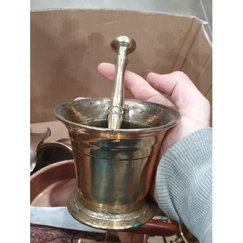 335 - A box of assorted Metalware including, large brass Jug, a copper two handled Pan, two brass Trivets,... 