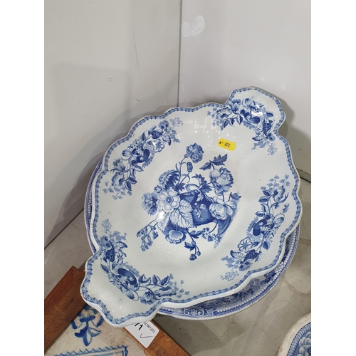 371 - Five pieces of 19th Century blue and white including Plates, a blue and white Muffin Dish and three ... 