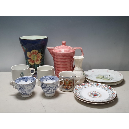 39 - A Royal Doulton floral Vase, a pottery covered Jug, Royal commemorative Mugs, a small Belleek Vase, ... 