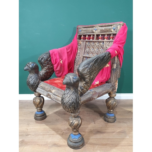 477 - A decorative Throne with scrolled and floral decoration, the front supports in the form of Birds, wi... 