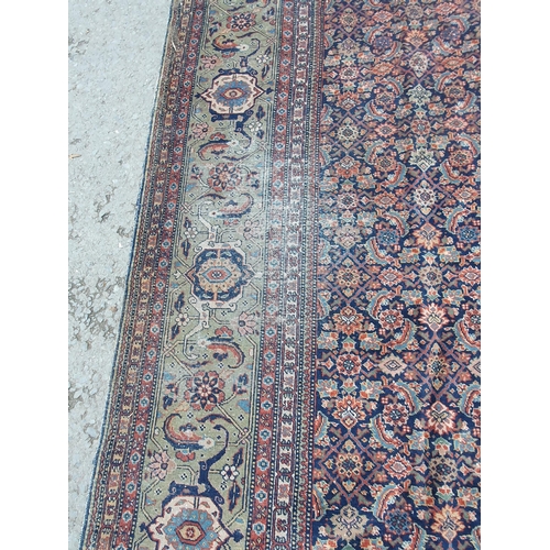 499 - A Persian style Carpet with multi borders with all over floral motif designs, A/F, faded and some re... 