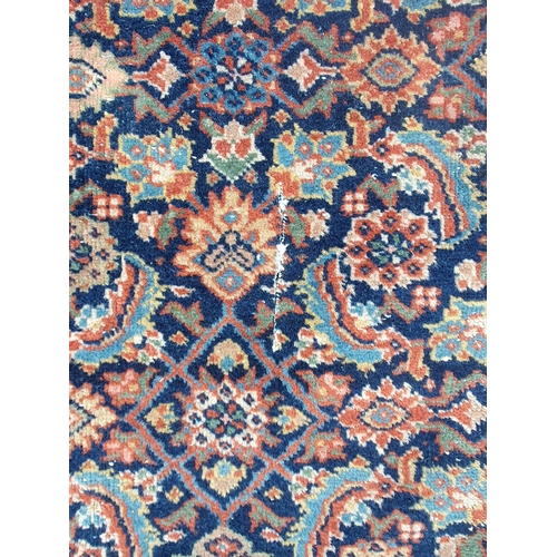 499 - A Persian style Carpet with multi borders with all over floral motif designs, A/F, faded and some re... 