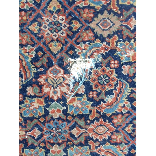 499 - A Persian style Carpet with multi borders with all over floral motif designs, A/F, faded and some re... 