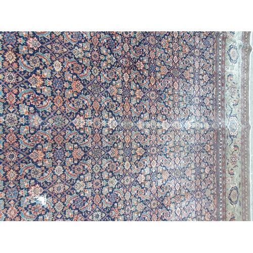 499 - A Persian style Carpet with multi borders with all over floral motif designs, A/F, faded and some re... 