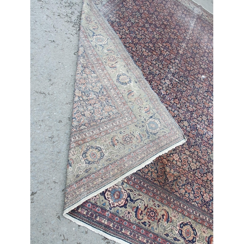 499 - A Persian style Carpet with multi borders with all over floral motif designs, A/F, faded and some re... 