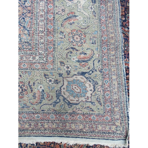 499 - A Persian style Carpet with multi borders with all over floral motif designs, A/F, faded and some re... 