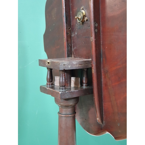 525 - A mahogany tilt top Occasional Table, with pie crust top on bird cage, with turned column on splayed... 