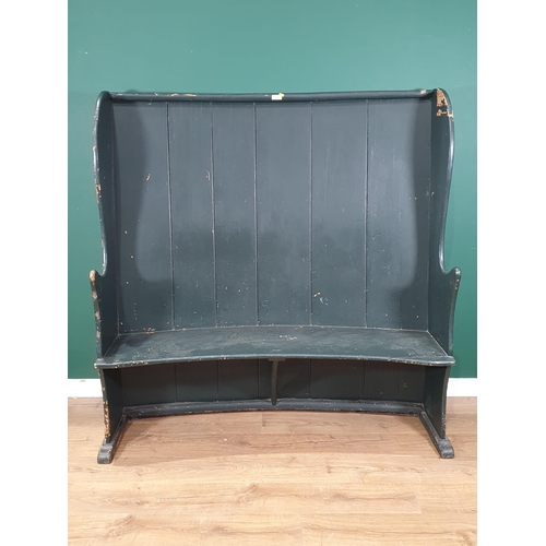 542 - A 19th Century curved back green painted Pine Settle, 5ft 3