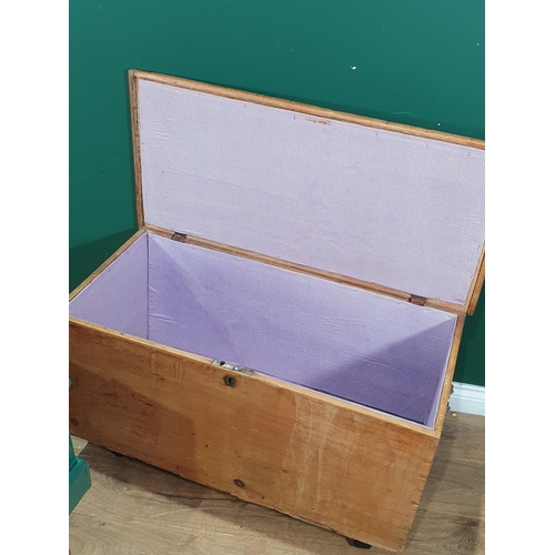 584 - A pine Blanket Box with brass carry handles on modern castors, 1ft 9