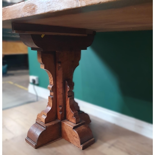 626 - A light oak Refectory Table with single fitted drawer, on quadruple pedestal supports, 2ft 6