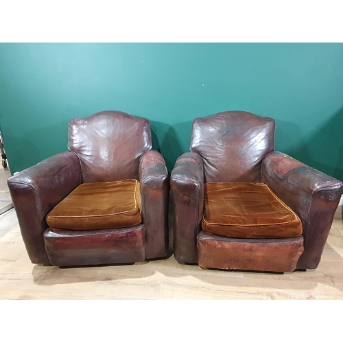 638 - A pair of leather upholstered Armchairs (R9)