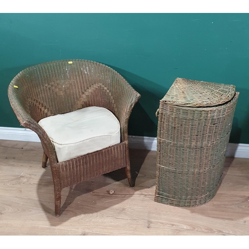 644 - A Lloyd Loom Armchair and a similar Linen Basket