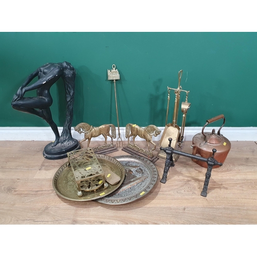 A box of metalware including brass horse Doorstops, copper Kettle