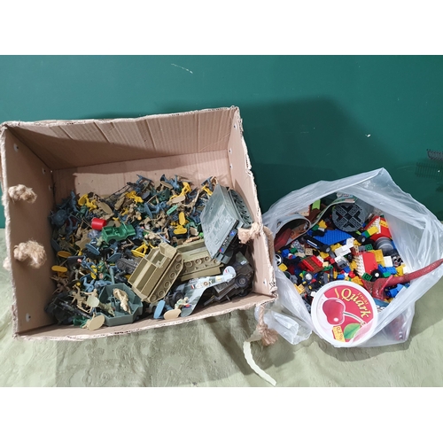 699 - A bag of Lego and a quantity of plastic Soldiers, Tanks, etc. (R7).