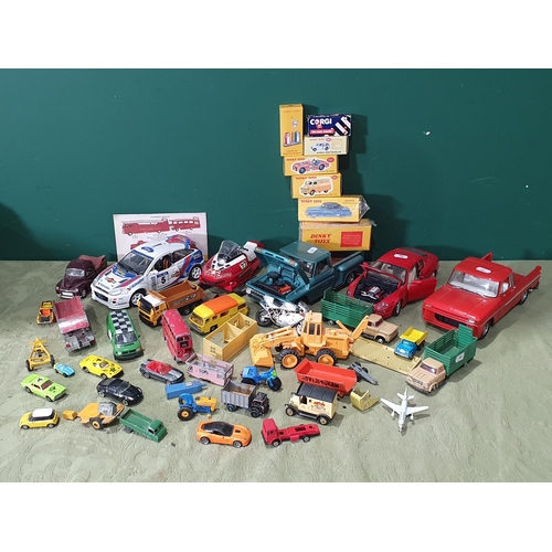 702 - Four boxed Atlas Dinky Toys Models, Sunstar Chevrolet Pick-up, another Sunstar Chevrolet Pick-up and... 