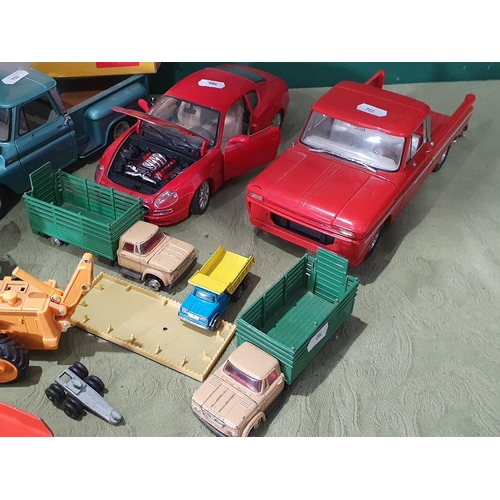 702 - Four boxed Atlas Dinky Toys Models, Sunstar Chevrolet Pick-up, another Sunstar Chevrolet Pick-up and... 