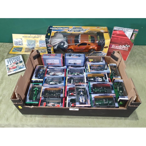 704 - A radio controlled Car and a box of boxed Grand Prix Racing Car (R10)