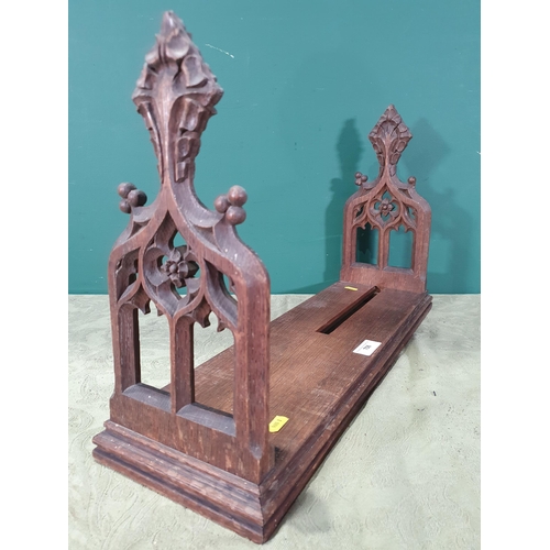 708 - An oak Bookstand with pierced tracery designed ends, 23in (R9)