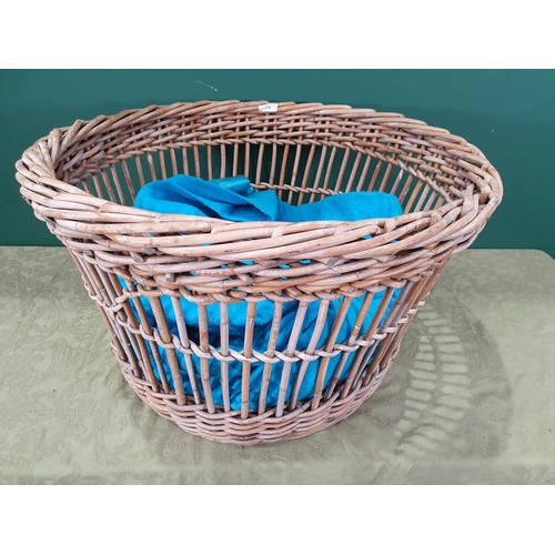 710 - A large wicker Log Basket 2ft 7in D x 1ft 5in H (R9)