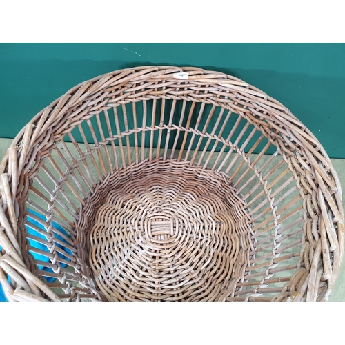 710 - A large wicker Log Basket 2ft 7in D x 1ft 5in H (R9)