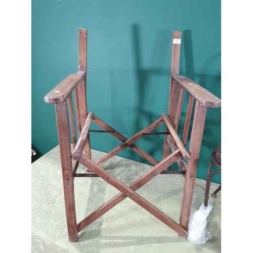 712 - A Director's Chair (lacking canvas) and a metal Garden Chair (R10)